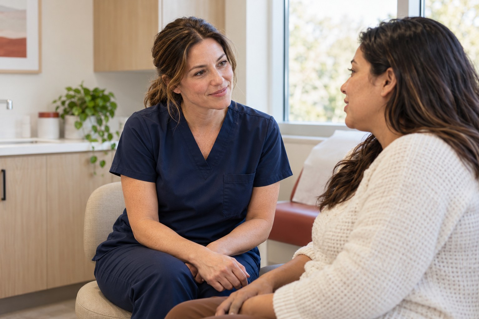 Illustrative image of a clinician listening to an adult patient